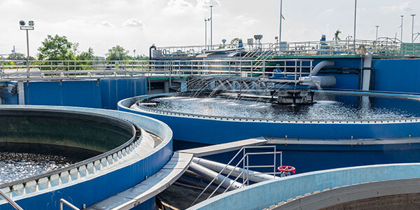 What is the agitator in water treatment and which material is used for it?