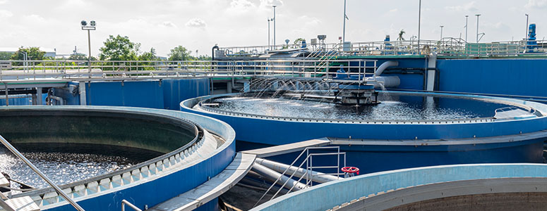 What is the agitator in water treatment and which material is used for it?